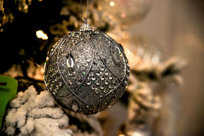 Close-up of christmas decoration hanging on tree