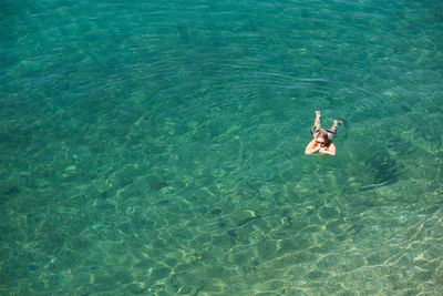 High angle view of man swimming in pool