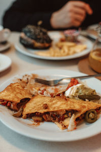 Famous mexican food quesadilla with chicken and cheese and jalapeno pepper