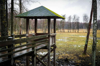 Built structure on landscape against sky