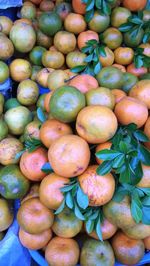 High angle view of oranges for sale at market stall