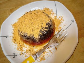 High angle view of cake in plate on table