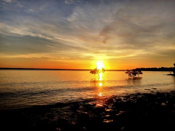 Scenic view of sunset over sea