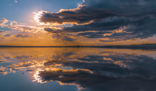 Scenic view of sea against sky during sunset