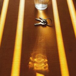 Close-up of shadow on table