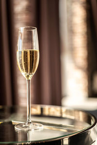 Close-up of wineglass on table