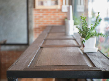 Close-up of table against trees