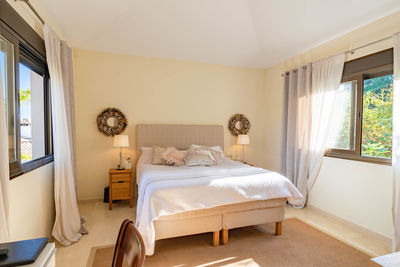 A image of the bed inside the master bedroom of a villa along the costa del sol