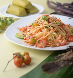 Close-up of noodles in plate on table