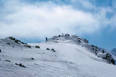 Scenic view of snowcapped mountain against sky