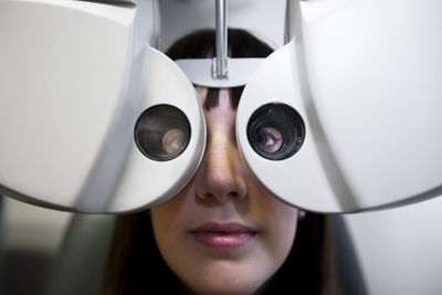 Girl having eye exam