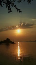 Scenic view of calm sea at sunset