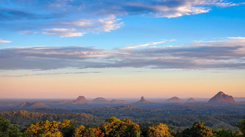 Scenic view of mountains against sky during sunset