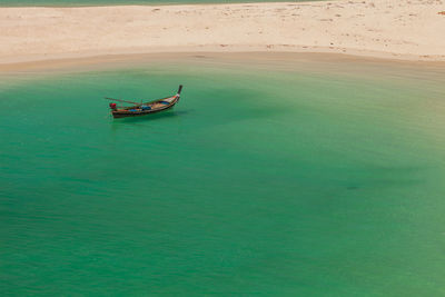 High angle view of man sailing on sea