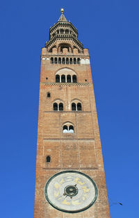 Low angle view of clock tower against sky