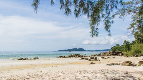 Scenic view of beach against sky