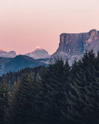 Scenic view of mountains against clear sky during sunset