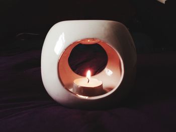 Close-up of lit candle