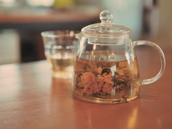 Close-up of drink in jar on table