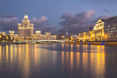 Illuminated buildings at waterfront