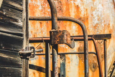 Close-up of rusty metal gate