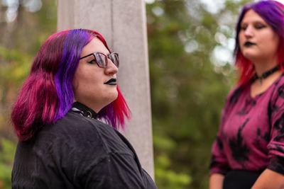 Side view of young women looking away