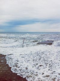 View of calm beach against the sky