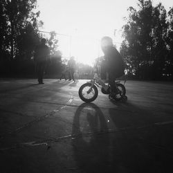 Man riding bicycle on street