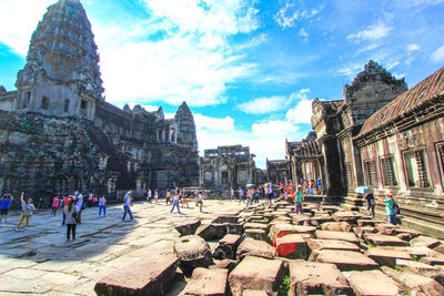 Group of people in front of historical building