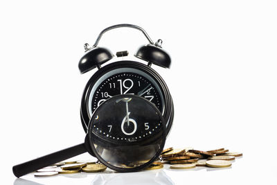 Close-up of clock against white background