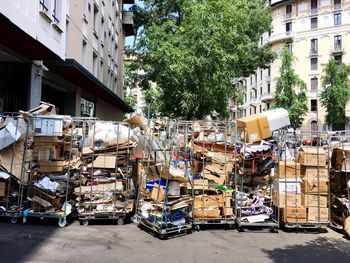 Cars on street by buildings in city