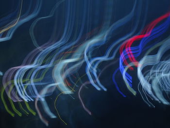 Close-up of light trails against black background