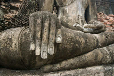 Close-up of buddha statue in temple