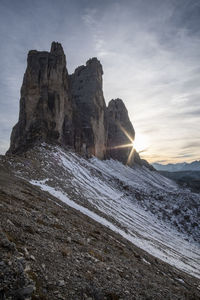 Rock formations on landscape against sky