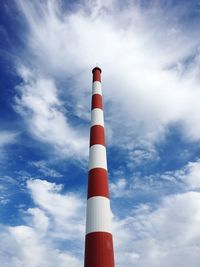 Low angle view of smoke stack against sky