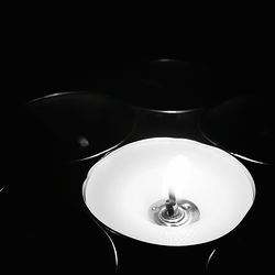 Close-up of lit candle