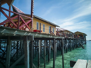 Water chalet view from the pier in a sunny day.