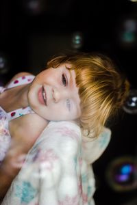 Portrait of cute girl smiling