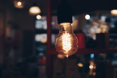 Close-up of illuminated light bulb