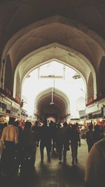 High angle view of people walking in subway station