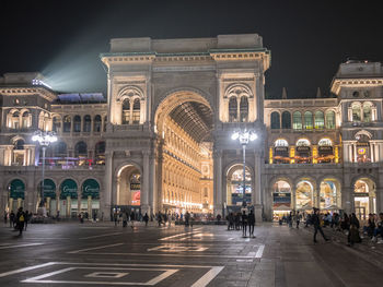 Group of people in city at night