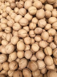 Full frame shot of walnuts for sale at market stall