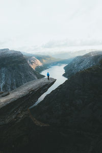 Scenic view of valley against sky during sunset