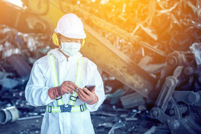 Man working on mobile phone