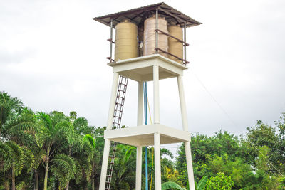 Low angle view of water tower against sky