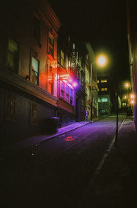 Illuminated street at night