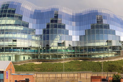 Low angle view of modern building against sky