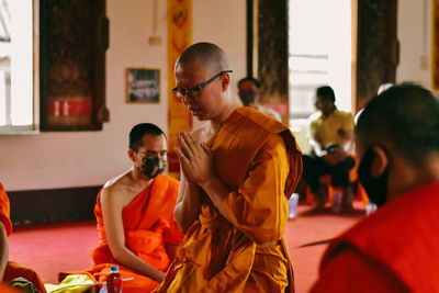 People sitting in temple