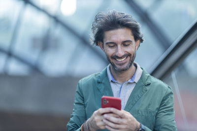 Young man using mobile phone