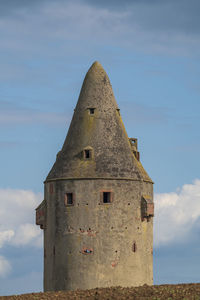 Low angle view of old building against sky